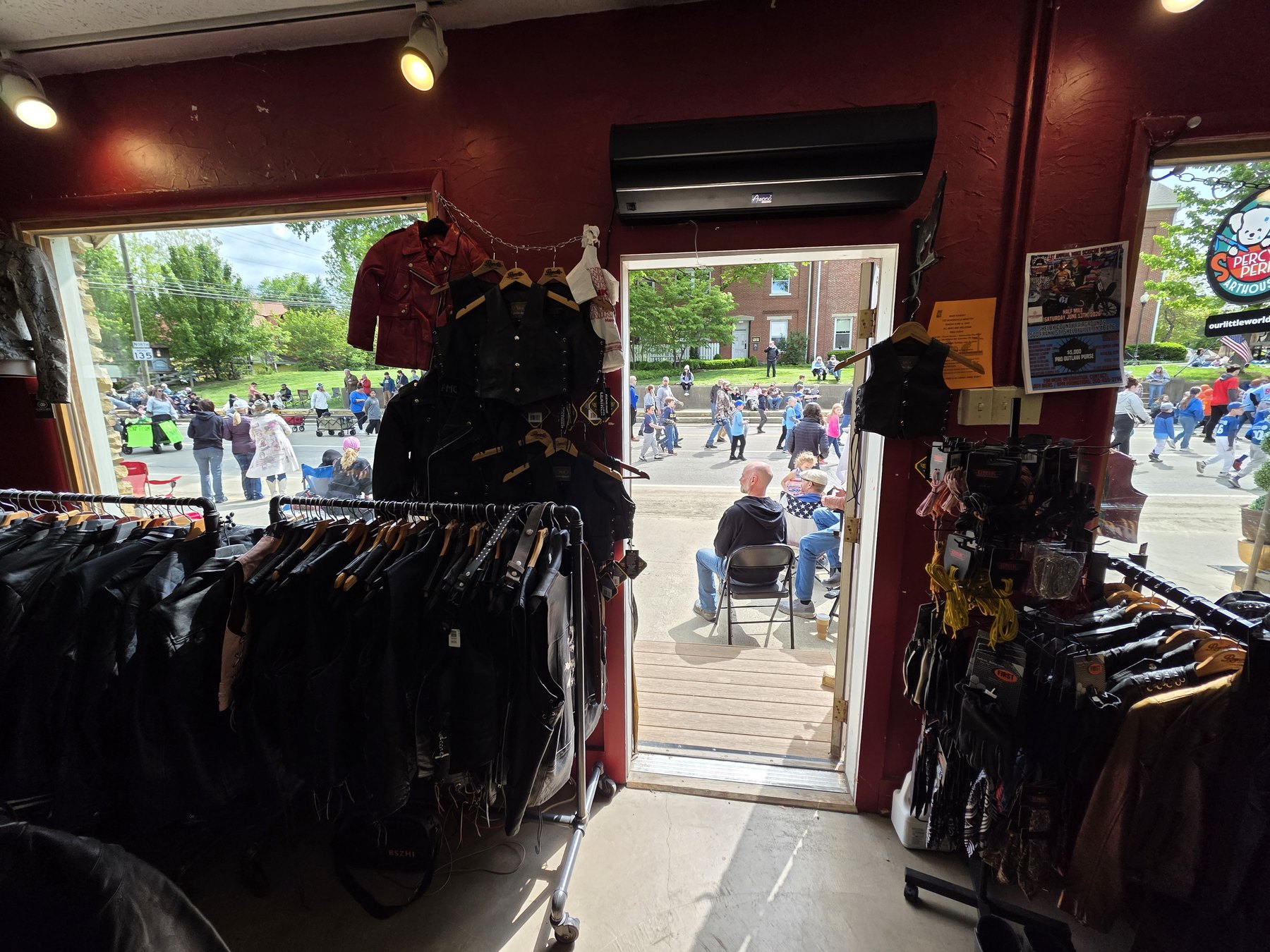 Looking out from inside Reynolds Leather during the 2026 Spring Blossom Parade
